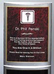 3D curved acrylic award with maroon marble engraving area