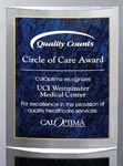 3D curved acrylic award with blue marble engraving area
