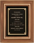 Solid walnut frame with gold trim and black velour background
