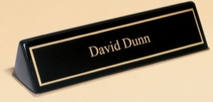 Ebony piano-finished nameplate